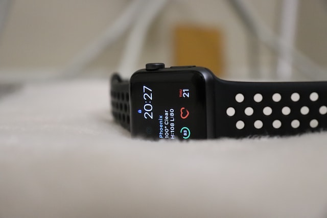 The image shows the best heart rate monitor for weightlifting laid on a cushion.